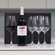 Personalised Wine & Crystal Glasses gift set featuring custom-labeled birthday wine bottle for 'Laura', four elegant crystal glasses—one filled with red wine—arranged in front of a black gift box. Personalised Wine & Crystal Glasses gift set featuring custom-labeled birthday wine bottle for 'Laura', four elegant crystal glasses—one filled with red wine—arranged in front of a black gift box.